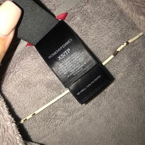 Gray fuzzy north face ladies jacket